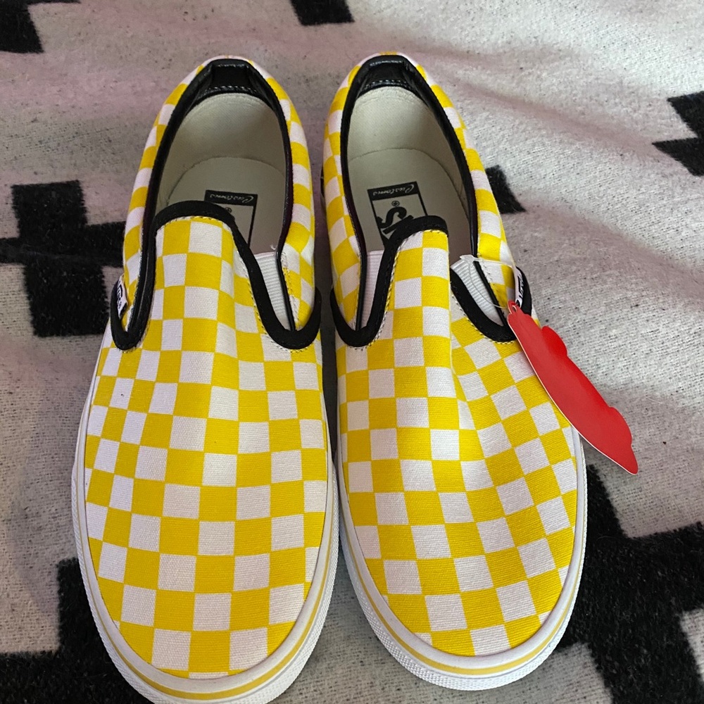 Yellow checkerboard and blue star vans